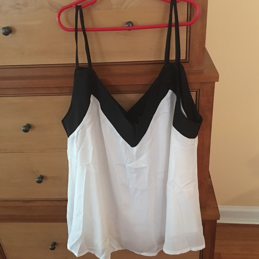 Pretty top. Light material. Like chiffon.